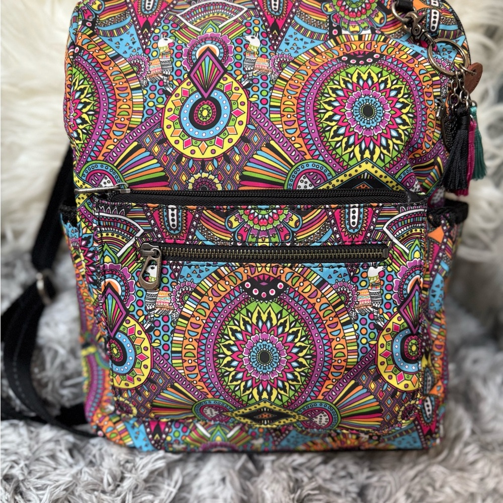 The Sak Blue and Orange Backpack with Bohemian Patterns